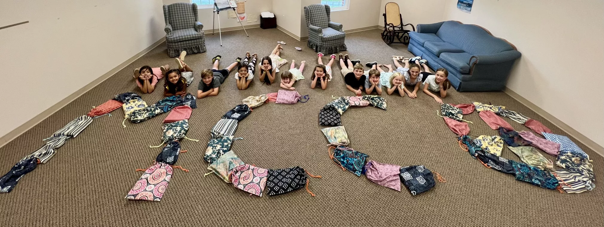 Members from a church pack school kits for MCC's School Kit Challenge.