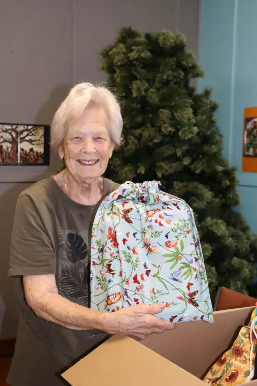 Members from a church pack school kits for MCC's School Kit Challenge.