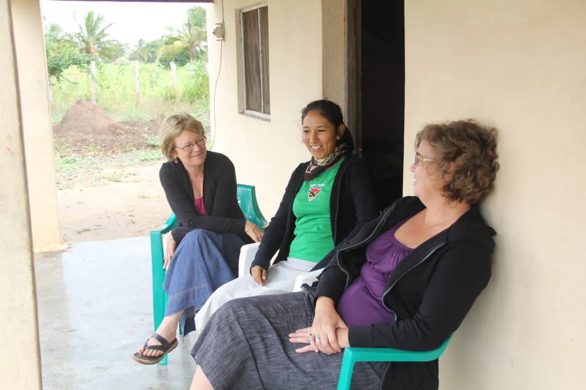 Group of ladies sitting in front of a classroom