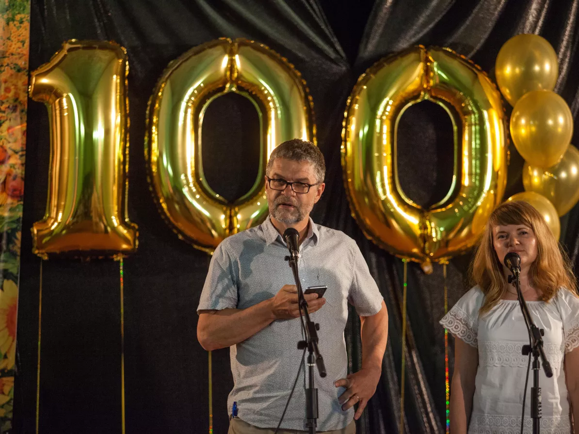 MCC Canada Executive Director Rick Cober Bauman shares some words at a special church service in Khortitsa, Ukraine, celebrating MCC's centennial.