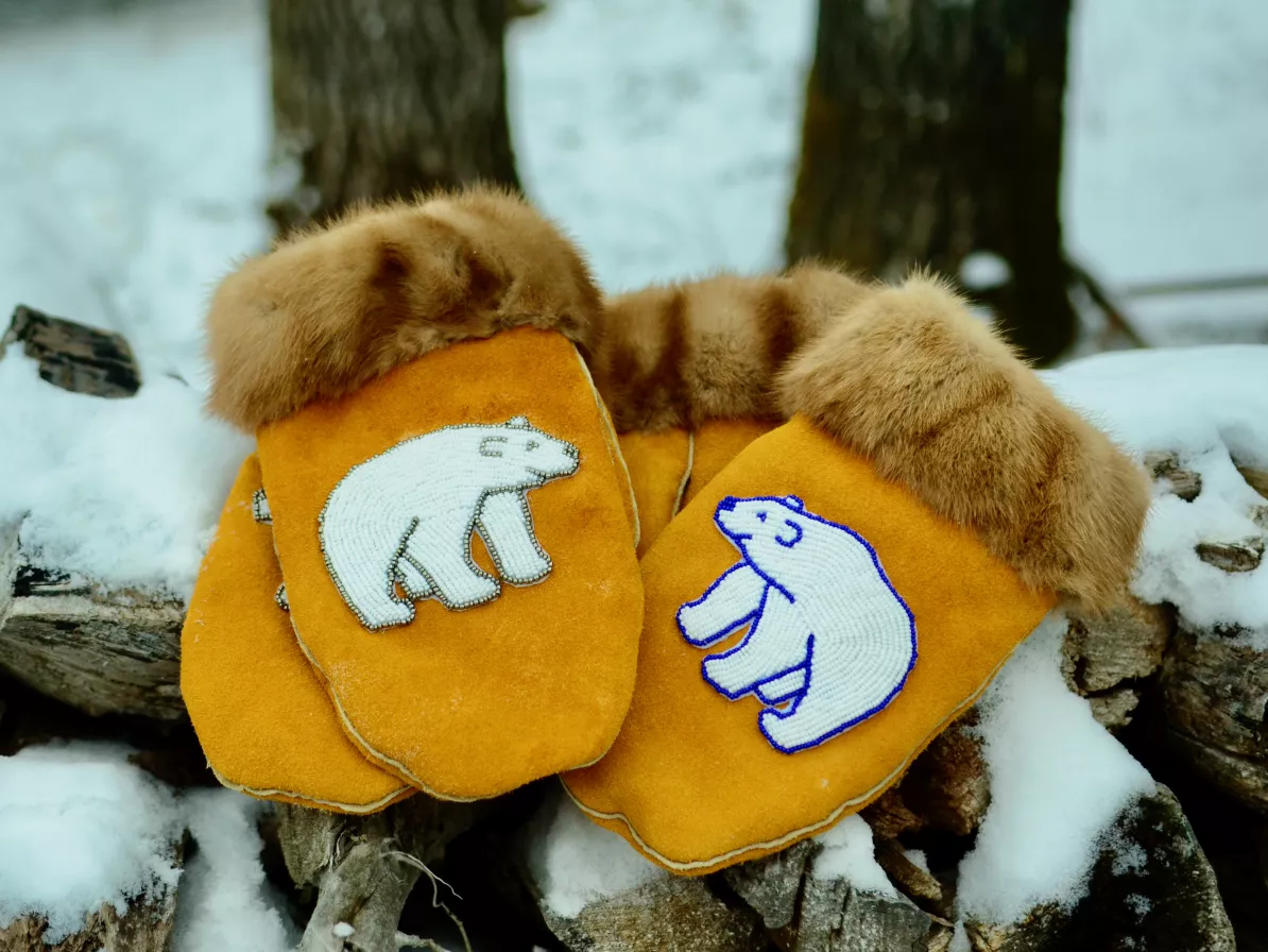pair of mittens with beaded polar bears