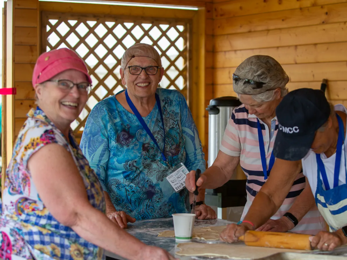 two relief sale volunteers in hairnets