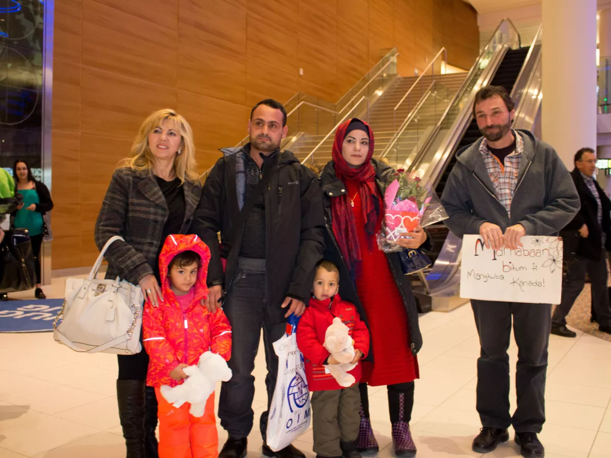 (From left) Fata Muheljic, Reyad Alhamoud, Najwa Hussein Al Mohamad, Paul Waldner, and children, (front) Raghad and Ali. 
	
	Elaine Hofer and Paul Waldner are members of Green Acres Colony, near Wa