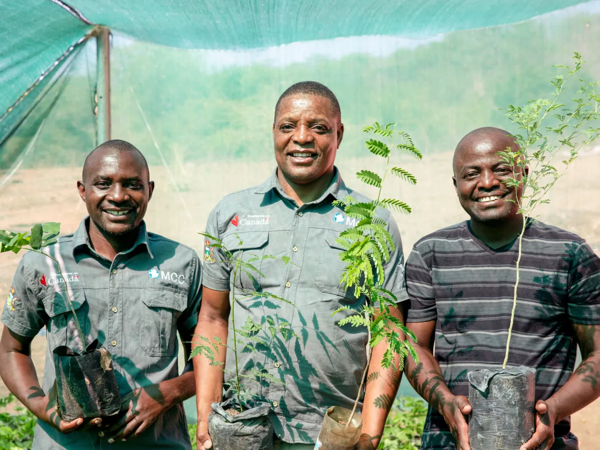 From left are staff with MCC partner Kulima Mbobumi Training Centre (KMTC): Jorama Munsaka, Environment and Climate Change Officer; Felex Ncube, Project Officer; and Bbaido Ndlovu, Monitoring and Eval