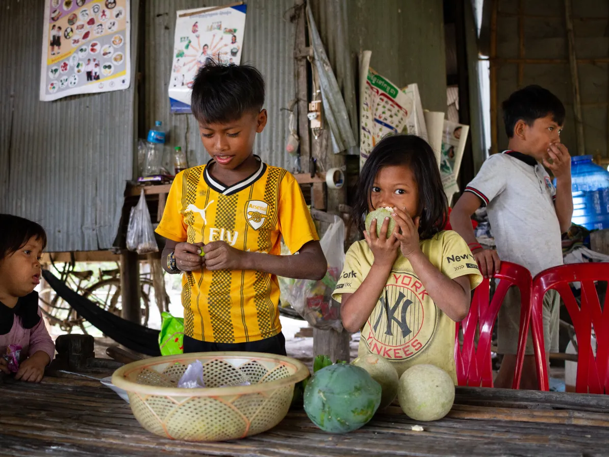 Children of two farming families supported by MCC partner Organization to Develop Our Villages (ODOV), from left, Visana Somneang, 3, neighbor Maly Chiro, 11, and Somneang's siblings Visana Dawieng 7,