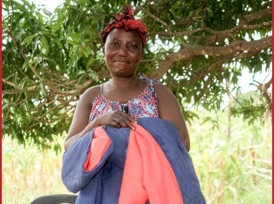 Woman holding a comforter