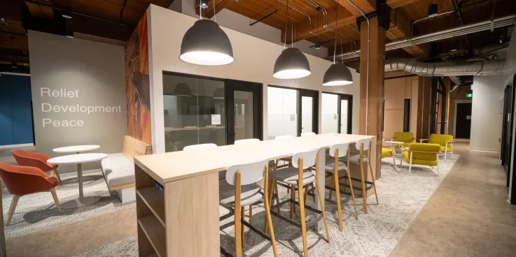 indoor shot of office with tables and chairs