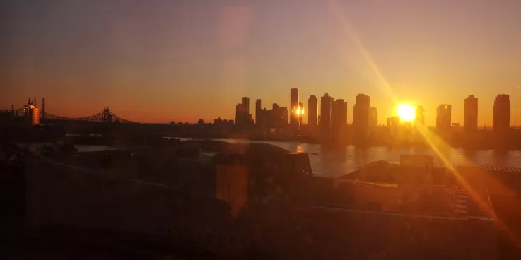 Sunset over the East River and the UN complex, from the view of the MCC UN office in New York City.