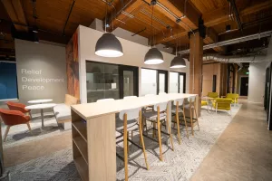 indoor shot of office with tables and chairs