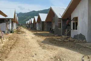 A row of houses in Indonesia that are being worked on.