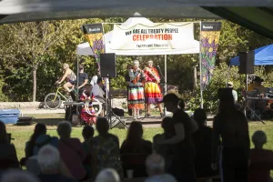 people speaking at stage of We are all treaty people