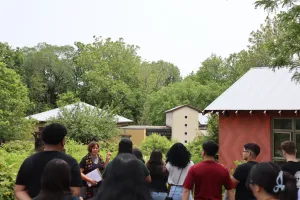 Young adults learn about native plants.
