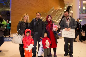 (From left) Fata Muheljic, Reyad Alhamoud, Najwa Hussein Al Mohamad, Paul Waldner, and children, (front) Raghad and Ali. 
	
	Elaine Hofer and Paul Waldner are members of Green Acres Colony, near Wa