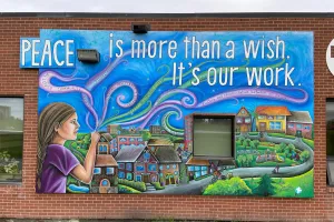 More Than A Wish (MTAW) mural on the south side of the head office at Plaza Drive, Winnipeg. Created by Annie Bergen.Annie is a muralist as well as an arts educator who creates group mural project