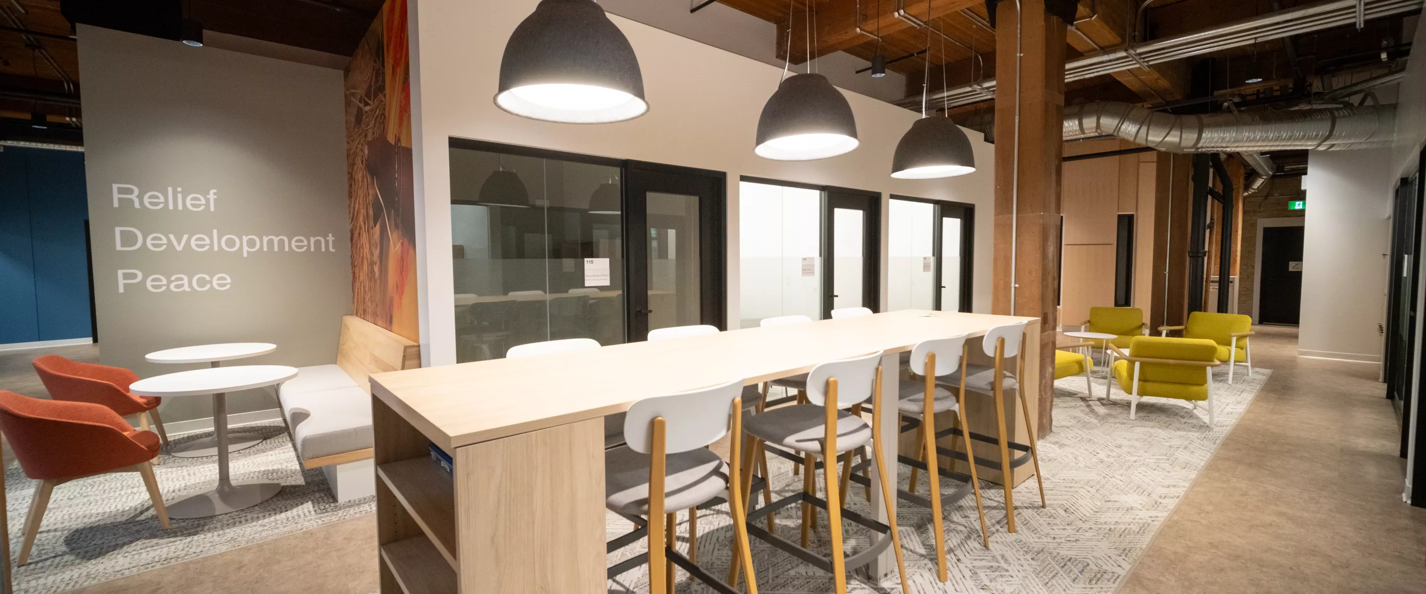 indoor shot of office with tables and chairs