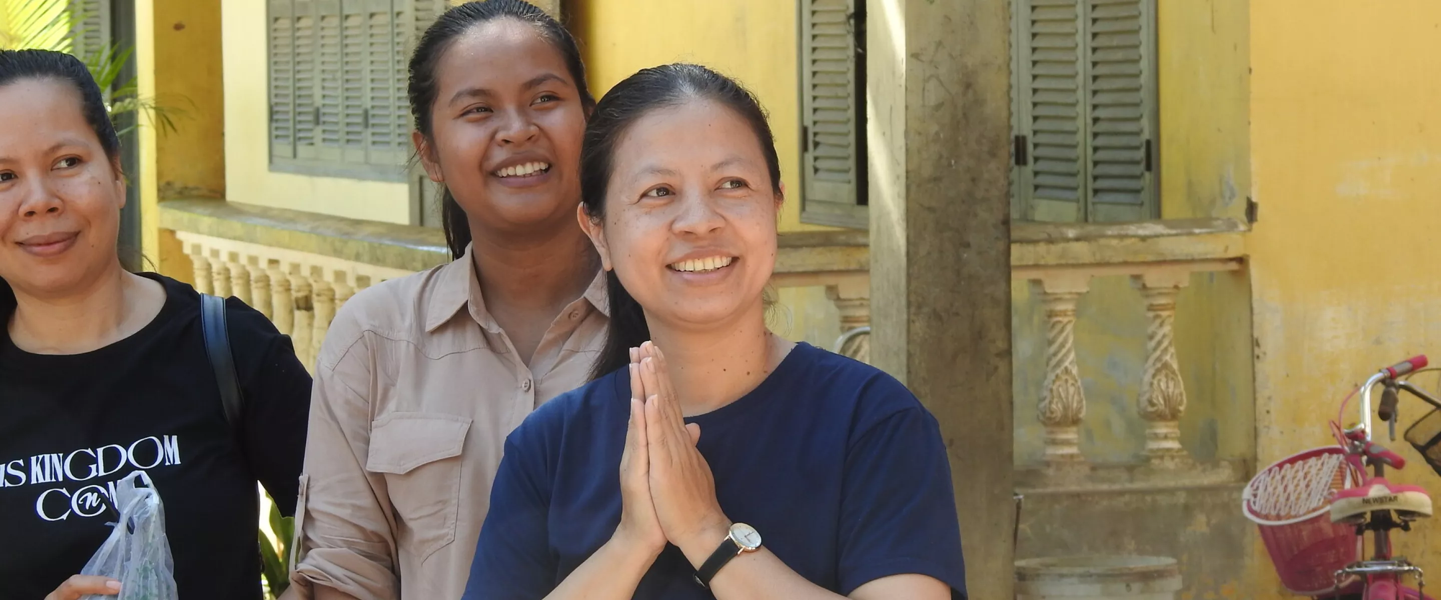 3 women smiling 