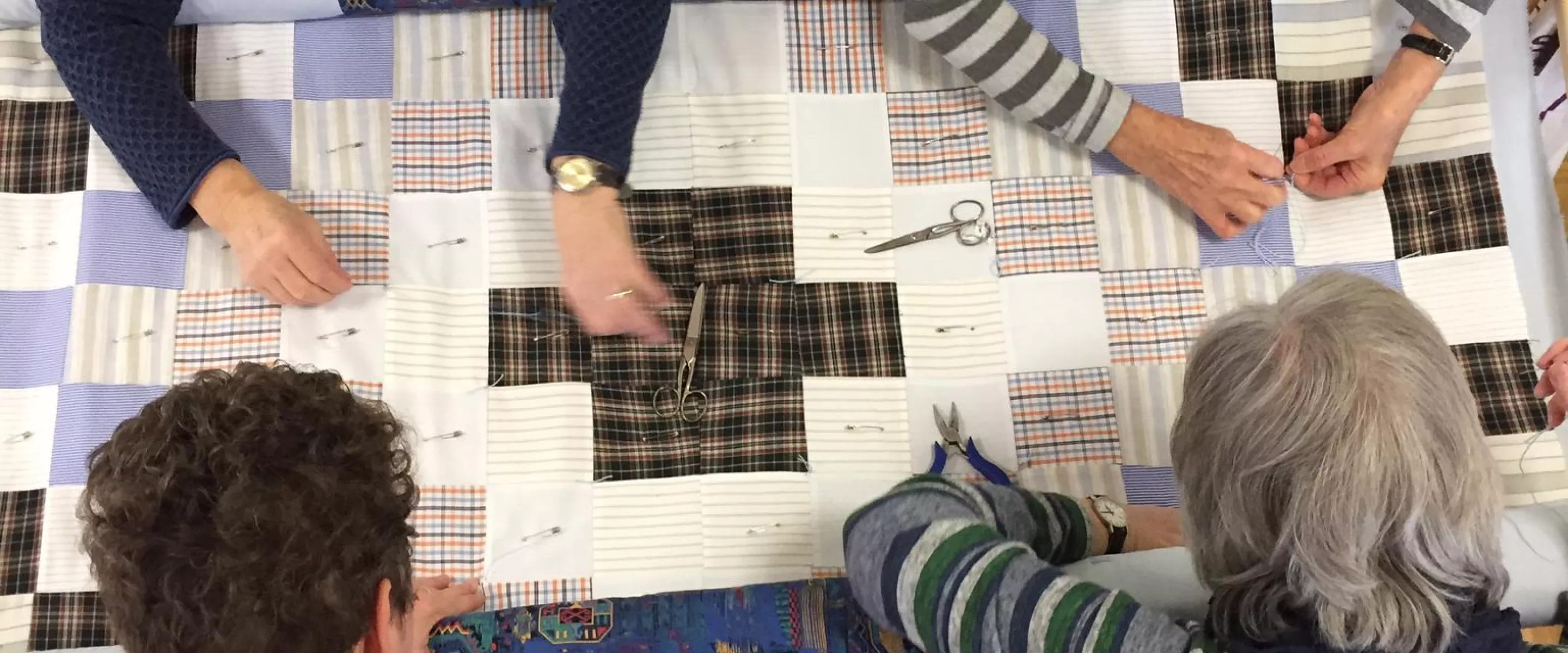 Women making comforters at Schantzli Mennonite Church (photo by Hiedi Rediger)