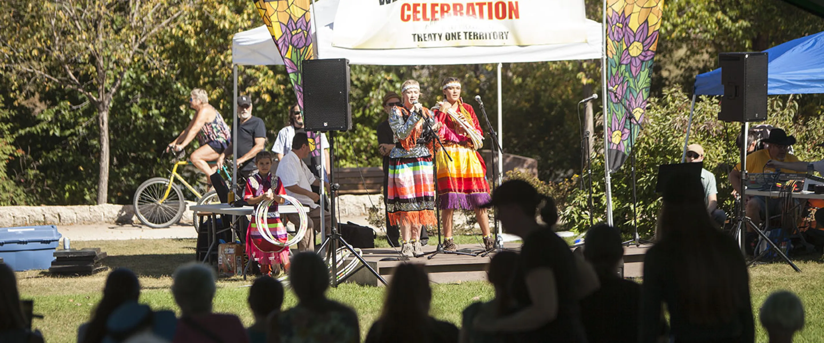 people speaking at stage of We are all treaty people