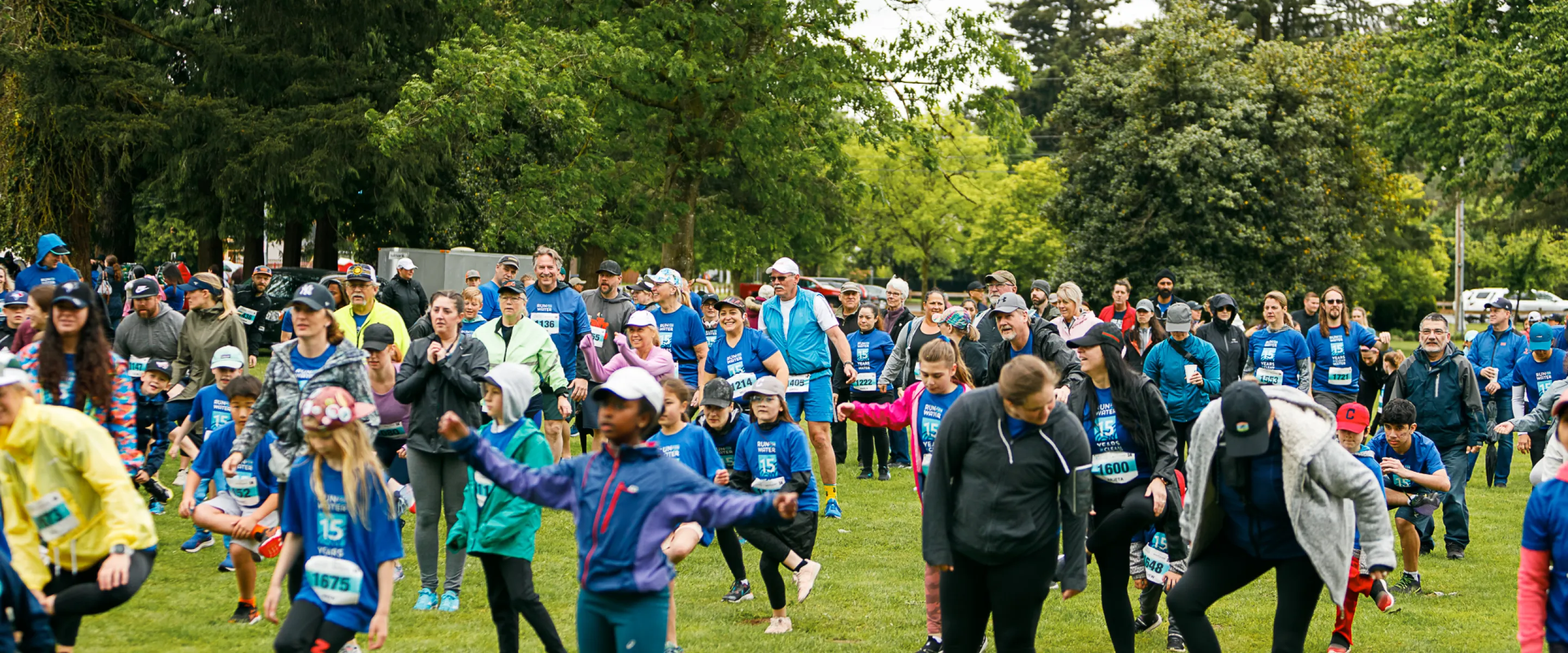 A group of people gather in a park