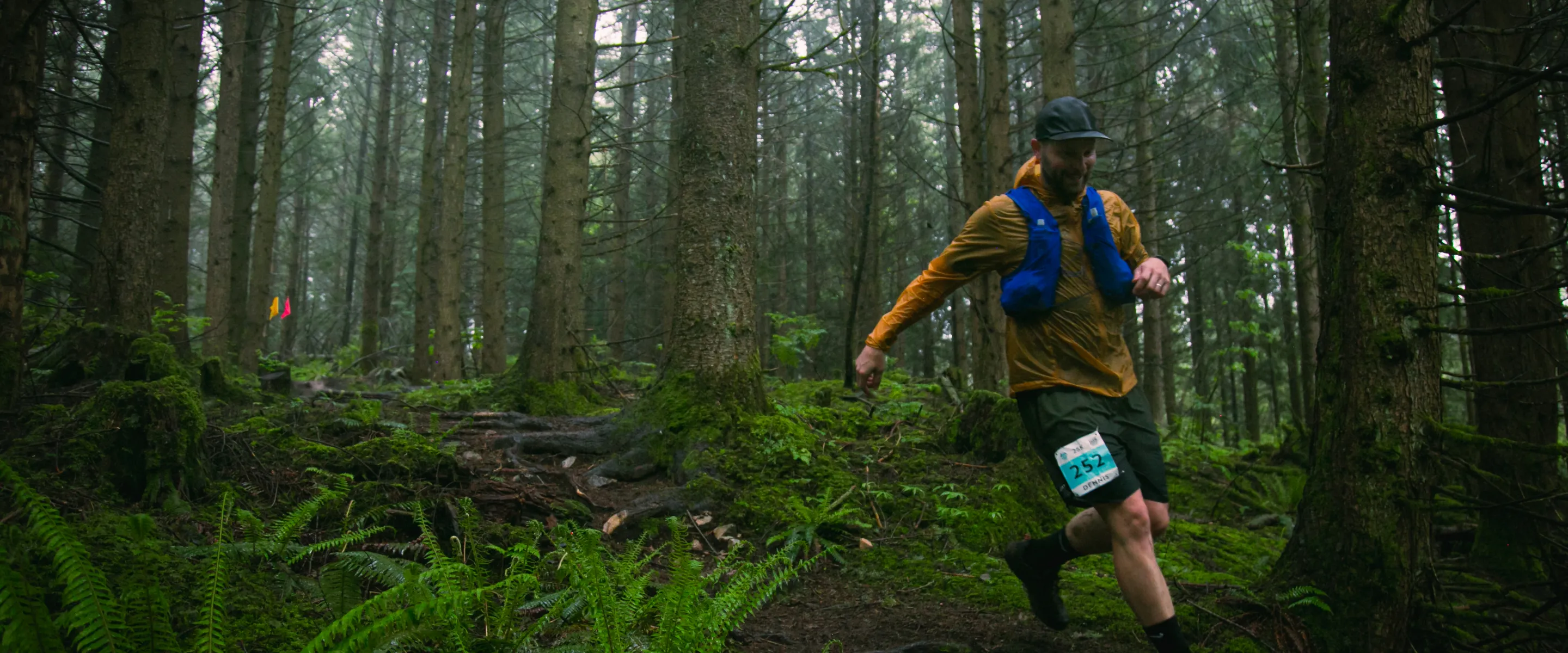 Man running through a forest