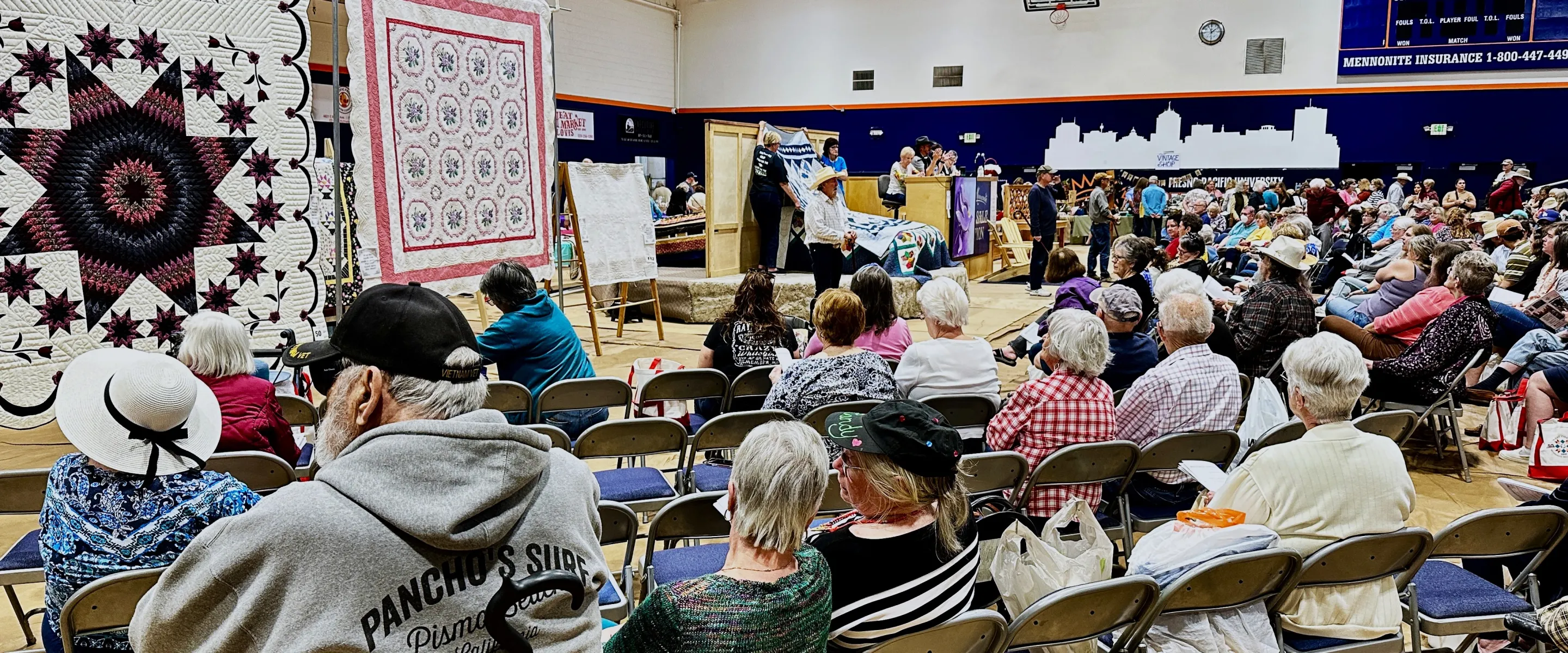 crowd at quilt auction