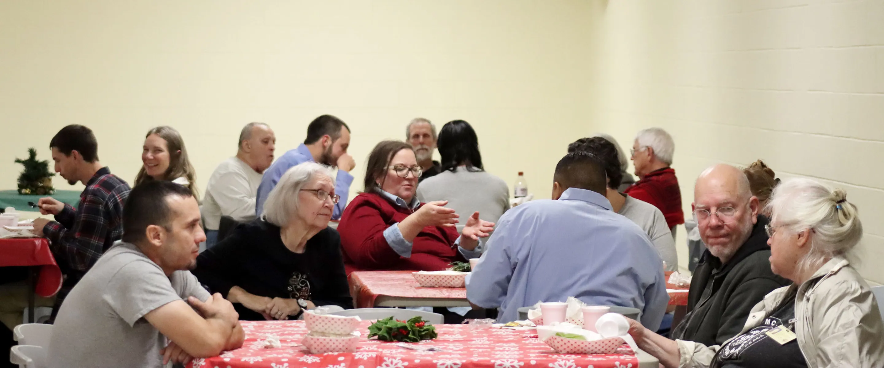 people talking around tables