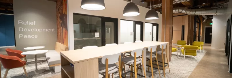 indoor shot of office with tables and chairs