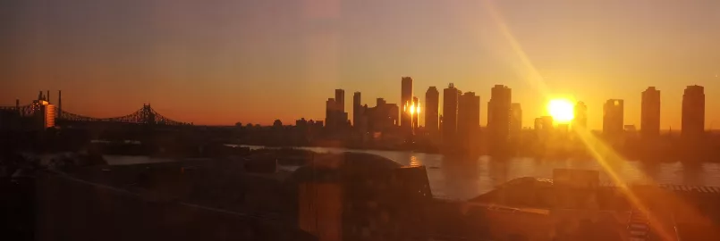 Sunset over the East River and the UN complex, from the view of the MCC UN office in New York City.