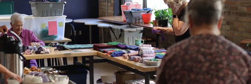 people packing kits together 