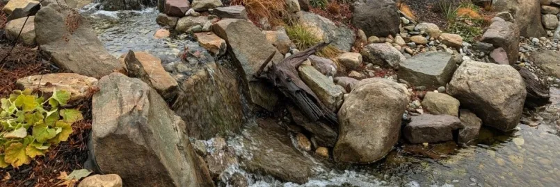 Stream passes through gray rocks