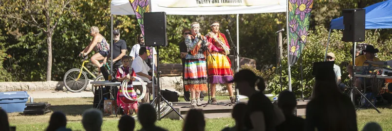 people speaking at stage of We are all treaty people