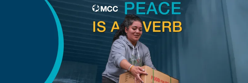 A woman unloading a truck, holding a box that says "Food for Relief." Text in the front reads, "MCC Peace is a Verb."