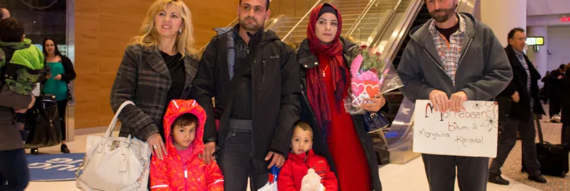 (From left) Fata Muheljic, Reyad Alhamoud, Najwa Hussein Al Mohamad, Paul Waldner, and children, (front) Raghad and Ali. 
	
	Elaine Hofer and Paul Waldner are members of Green Acres Colony, near Wa