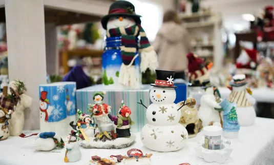 Christmas decorations for sale at an MCC thrift shop