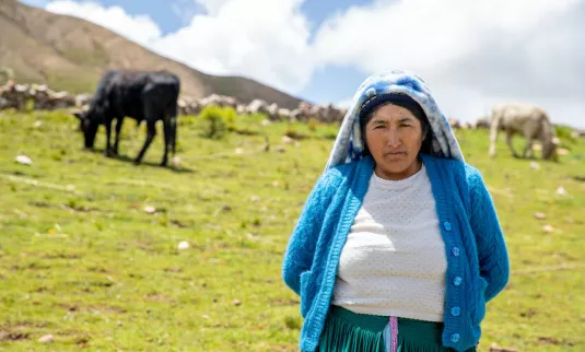 A woman standing in a field