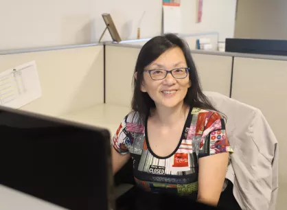 A woman sitting at a desk