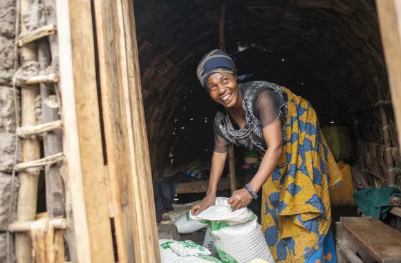 A woman receiving relief supplies