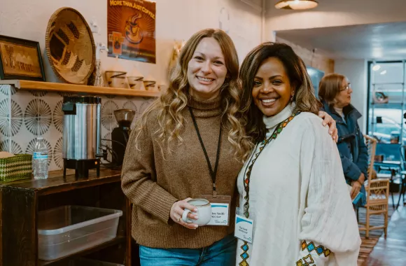 Two women standing for a photo