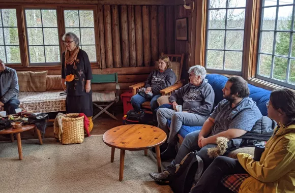 A group of people sitting in a room together