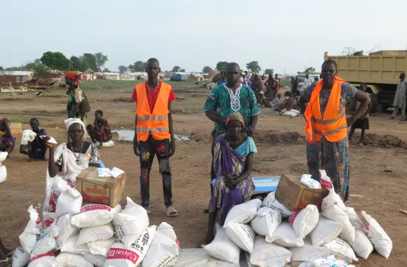 A group of people distributing emergency food supplies
