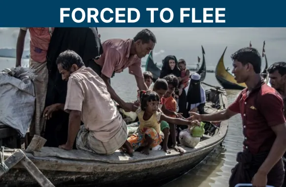 a group of refugees in a boat