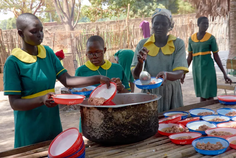 meals at school.jpg Group of students in South Sudan eating a meal.