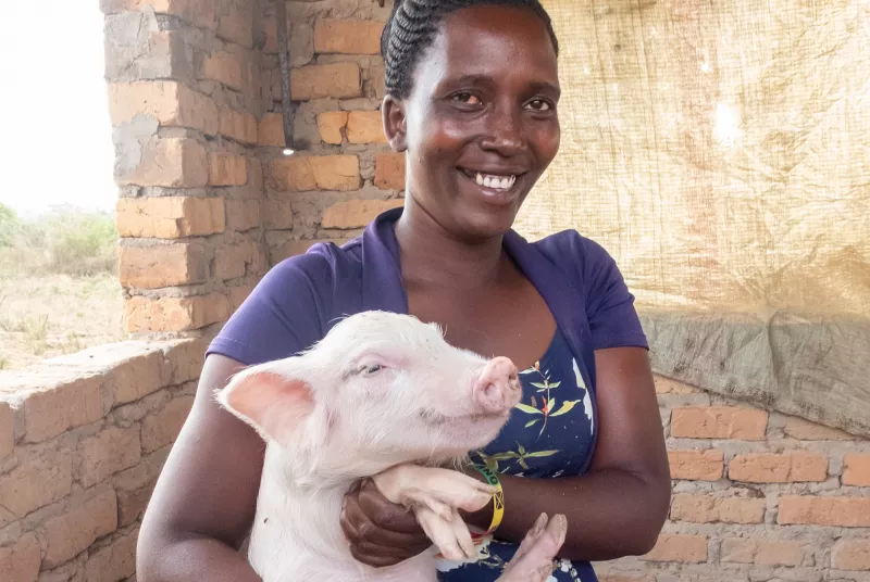piglet2.jpg Mary Ilero and her piglet.