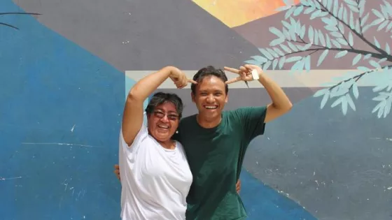 Two people smiling for a photo