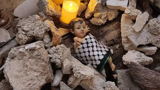 baby Jesus lying in the rubble