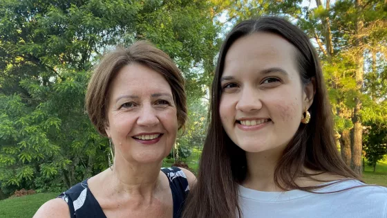 A mother and daughter taking a selfie photo