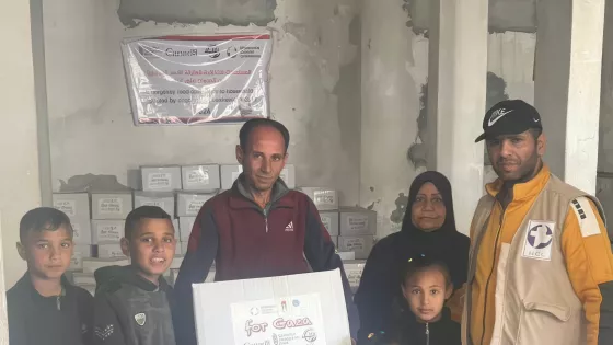 Al-Najd Developmental Forum staff distribute emergency food that has just arrived in Gaza for distribution to families. The shipment arrived on March 19 and was distributed on March 23.  *Names withheld for security reasons.