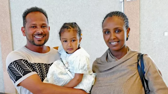 A happy family reunited after over 12 months apart! Bizuayehu Abera, holding daughter Medan and standing with his wife Senayt, was project manager of Tigray relief for Meserete Kristos Church in Ethiopia when the border was blockaded and he was stuck in Addis Ababa, away from his family in Tigray.