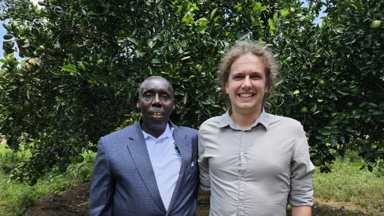 Andy Arthur with Sam Eibu Okiror