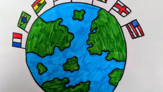 children's artwork of globe with eight flags on top of it